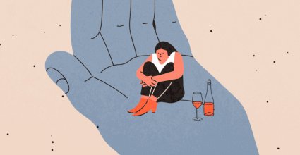 adolescente dans une main avec un verre de vin